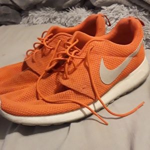 Orange nike shoe athletic size 11